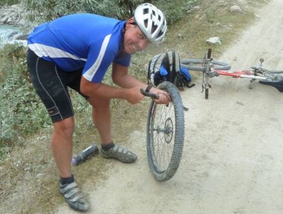 Clive Smith Cycling on the  tour with redspokes